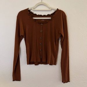 burnt orange American eagle top. Size large